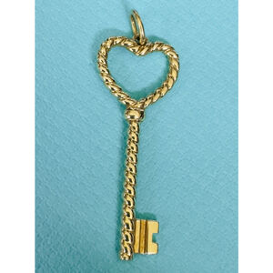 Tiffany & Co. 18k Gold Twisted Heart Key Pendant/Charm
